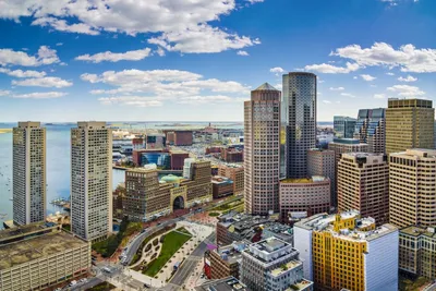 Boston Skyline At Boston Harbor At Sunrise, USA Stock Photo, Picture and  Royalty Free Image. Image 136372725.