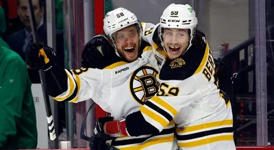 With heavy heart, Brad Marchand lifts Bruins over Columbus with hat trick