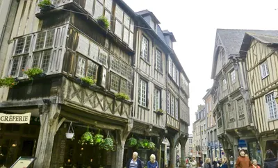 Dinan, France - 10 July 2017: Traditional Half-timbered Medieval Houses On  A Central Street In The Historical Old Town Of Dinan, A Popular Tourist  Destination In Brittany, France Stock Photo, Picture and