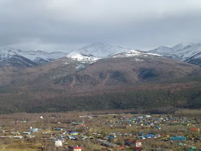 Esso, Kamchatka Peninsula, Russia- 02 October 2014: Housing estate of small  wooden houses in a small town in center of sKamchatka Peninsula Stock Photo  - Alamy