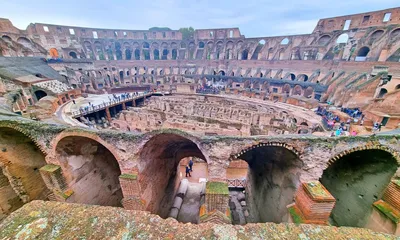 Рим: индивидуальная фотосессия возле Колизея | GetYourGuide
