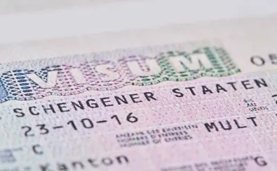Виза Schengen в паспорте стоковое изображение. изображение насчитывающей  согласования - 154840333
