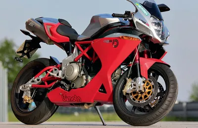 Итальянский мотоцикл спорта Стоковое Фото - изображение насчитывающей  красно, мощно: 26542970