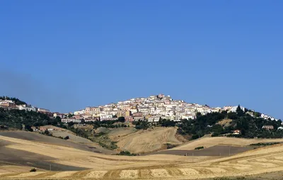 Candela, Italy, June 23, 2021. A small street between the old houses of a  mediterranean village of Puglia region Stock Photo - Alamy