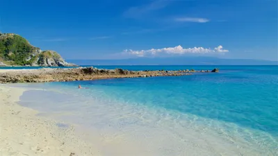 Aerial view of Capo Vaticano, Calabria, Italy. Lighthouse and promontory.  Rocks overlooking the sea. Praia I Focu beach and A Ficara beach. Boats  Stock Photo - Alamy