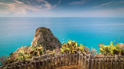 Aerial view of Capo Vaticano, Calabria, Italy. Lighthouse and promontory.  Rocks overlooking the sea. Praia I Focu beach and A Ficara beach. Boats  Stock Photo - Alamy