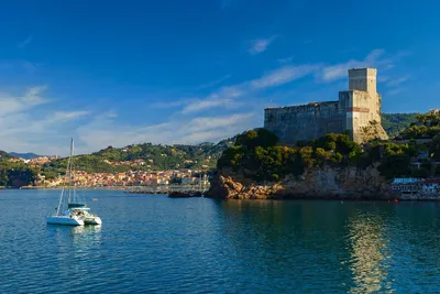View of castle of Lerici and gulf of Lerici. Colorful building on harbour.  Beautiful small city Lerici, Italy, Liguria. Poet's bay at sunset. Stock  Photo | Adobe Stock