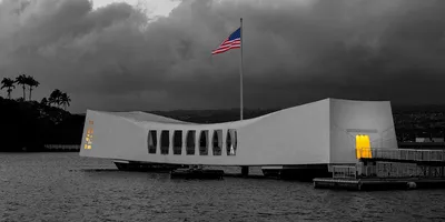 Pearl Harbor National Memorial - Visitors to the USS Arizona Memorial can  see barbette #3, which held gun turret #3, above the waterline and very  close to the memorial. Barbette #3 had