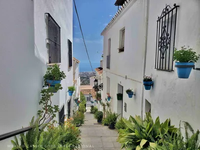 The Street of San Sebastian In Mijas Spain. One of the most photographed  streets of the Costa del Sol Stock Photo - Alamy