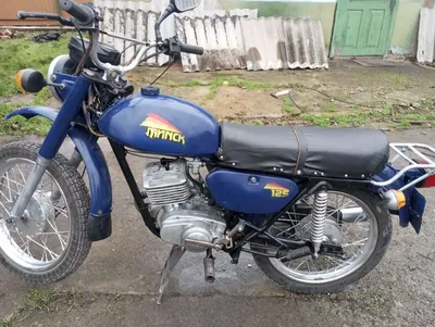 Man on Romet Minsk 125 motorbike near Dobropillia, Donetsk Oblast on 19 May  during 2014 pro-Russian conflict in Ukraine Stock Photo - Alamy