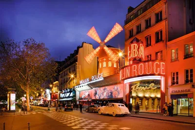 The cabaret Moulin Rouge Paris in Montmartre and the French Cancan