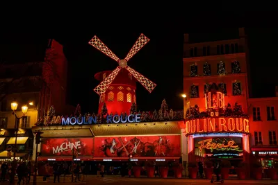 The famous Moulin Rouge building in Paris during the day Stock Photo - Alamy