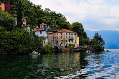 Italy | Travel | Inspiration on Instagram: \"The mesmerising beauty of  Nesso🇮🇹✨ Nesso is a small Italian village of red rooftops and tall brick  houses that tumble down a steep slope all