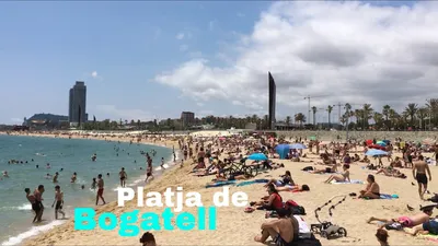 Beach goers enjoy at Bogatell beach in Barcelona as summer temperatures  rise. The Barcelona City Council has designed a protocol to control volumes  of people, with a maximum capacity for each beach.