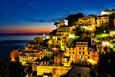 Riomaggiore beautiful typical antique village in Cinque Terre at sunset, in  Italy Photograph by Luis Pina - Pixels