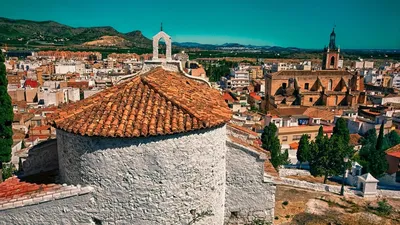 Spain, Valencia Community, Sagunto village, overview of the village and the  church Stock Photo - Alamy
