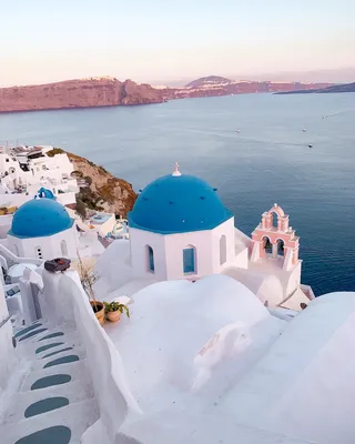 Santorini 🇬🇷 Travel | Hotels | Food on Instagram: \"Would you rather visit  Santorini or Italy first? 🇬🇷🇮🇹 💡 Santorini's mesmerizing sunsets,  while Italy boasts historic charm and diverse landscapes, from Rome's