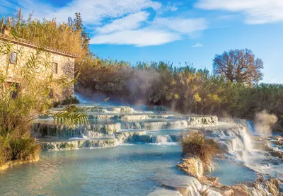 Termas de Saturnia, Toscana, Itália | Cool places to visit, Vacation trips,  Hot springs