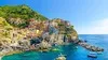 Picturesque town of Vernazza, in the province of La Spezia, Liguria, Italy  after sunset Stock Photo - Alamy