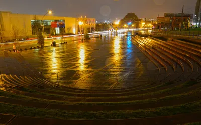 Cityscape with street and tram line at night, Tacoma, Washington, USA stock  photo