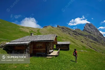 Aerial view of houses and mountains and the huge alpine meadow Seiser Alm  in Bolzano, South