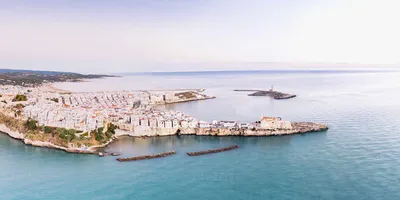 Scenic sunset view over historic old town and church of San Francesco,  Vieste, Gargano, Apulia, Italy 17323685 Stock Photo at Vecteezy