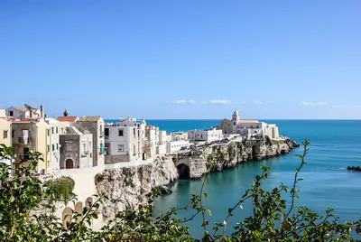 Times Travel Ltd. - Beach of Pizzomunno rock, Vieste - Italy Italy is so  beautiful with sublime cities like Rome, Milan, Florence, with miles of  coastline, romantic villages like Positano or Portofino.